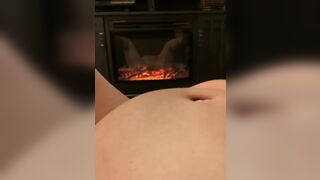 Masturbation in Front of Fireplace. Preggy Abdomen. Erotic Movie - 2 image