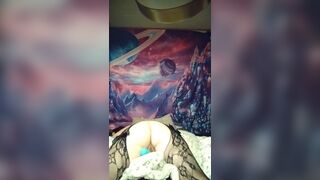 Little pink fur pie squirms away from toy