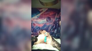 Little pink fur pie squirms away from toy