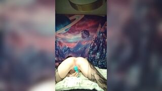 Little pink fur pie squirms away from toy - 7 image