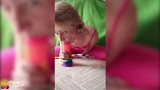 Woman Jumping on Rainbow Sex-Toy and Playing with Wazoo Plug - 1 image