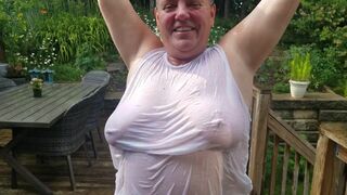 Tarablee Hotz- cooling off in the rain on a sexy day. My juicy t-shirt barely conceals my large billibongs. - 10 image
