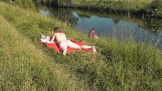 Wild beach. Hot mother I'd like to fuck Platinum nude sunbathing on river bank, random fisherman man watches. Undressed in public. Exposed beach - 15 image