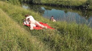Wild beach. Hot mother I'd like to fuck Platinum nude sunbathing on river bank, random fisherman man watches. Undressed in public. Exposed beach - 7 image