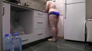big beautiful woman mother I'd like to fuck housewife in the kitchen wearing merely pants. - 6 image