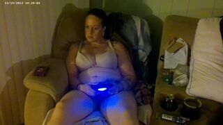 Breasty Lengthy Hair Brunette Hair In Brassiere and Pants Playing PlayStation - 1 image