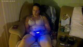 Breasty Lengthy Hair Brunette Hair In Brassiere and Pants Playing PlayStation - 15 image