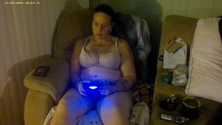 Breasty Lengthy Hair Brunette Hair In Brassiere and Pants Playing PlayStation - 5 image