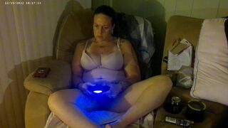 Breasty Lengthy Hair Brunette Hair In Brassiere and Pants Playing PlayStation - 7 image