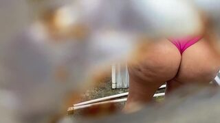 Pervert records through the outdoor dressing hole - 11 image