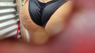 Voyeur dressing room on the beach recording through the dressing room hole outdoors