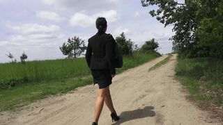 Peeing in stockings on a road.