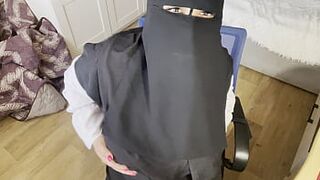 A Turkish woman with beautiful eyes in a hijab masturbates in pantyhose - 1 image