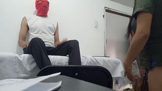 A very feminine doctor masturbates in front of a patient while providing medical care.