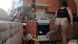 Sexy mom makes breakfast, hairy pussy, big tits. Sexy woman clears out the house, hairy, big ass.
