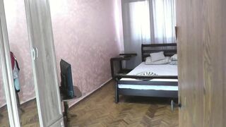 Konstanzia, the blonde MILF, pleasures herself solo and squirts in the bedroom