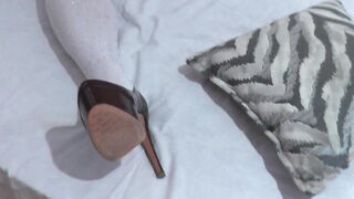 Konstanzia, the blonde MILF, pleasures herself solo and squirts in the bedroom