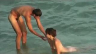 Stripped Beach - Voyeur Captures Cute Little Tit Fuck and BJ - 2 image