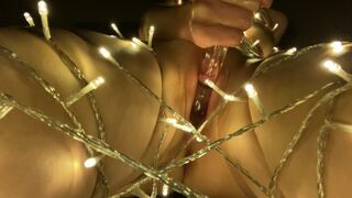 I Bound myself up in Christmas Lights and used a Large Glass Toy to please and Stretch my Swollen Cunt - 1 image